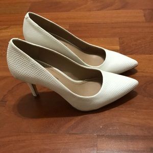 White pointy heels